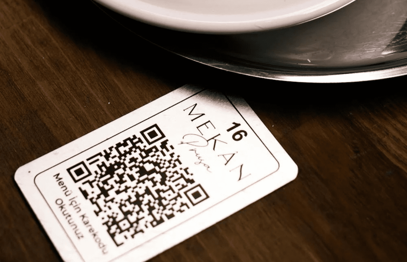 A flyer or menu with a QR code