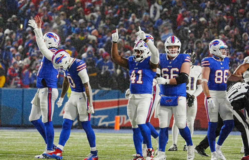 The Bills turn and celebrate with the crowd their victory over the Baltimore Ravens at Highmark Stadium in Orchard Park on Jan. 19, 2025.