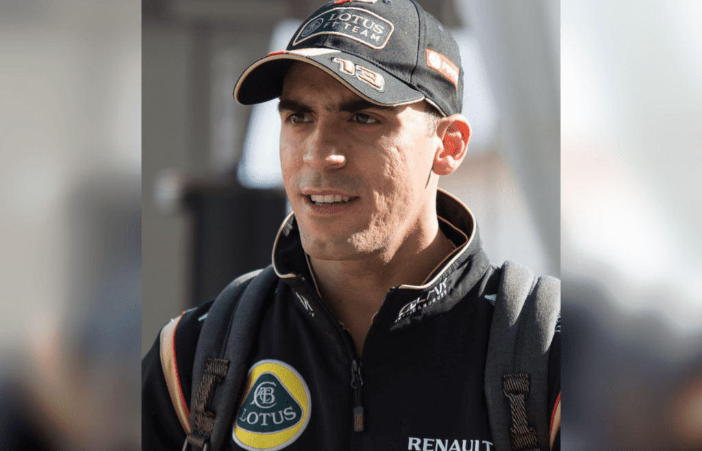 Nov 2, 2014; Austin, TX, USA; Lotus driver Pastor Maldonado (13) of Venezuela enters the paddock prior to the 2014 U.S. Grand Prix at Circuit of the Americas. Mandatory Credit: Jerome Miron-Imagn Images