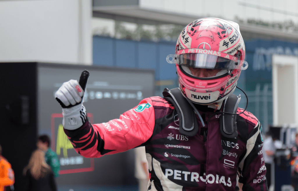 May 4, 2025; Miami Gardens, FL, USA; Mercedes driver George Russell (63) celebrates after finishing third during the F1 Miami Grand Prix at Miami International Autodrome. Mandatory Credit: Sam Navarro-Imagn Images