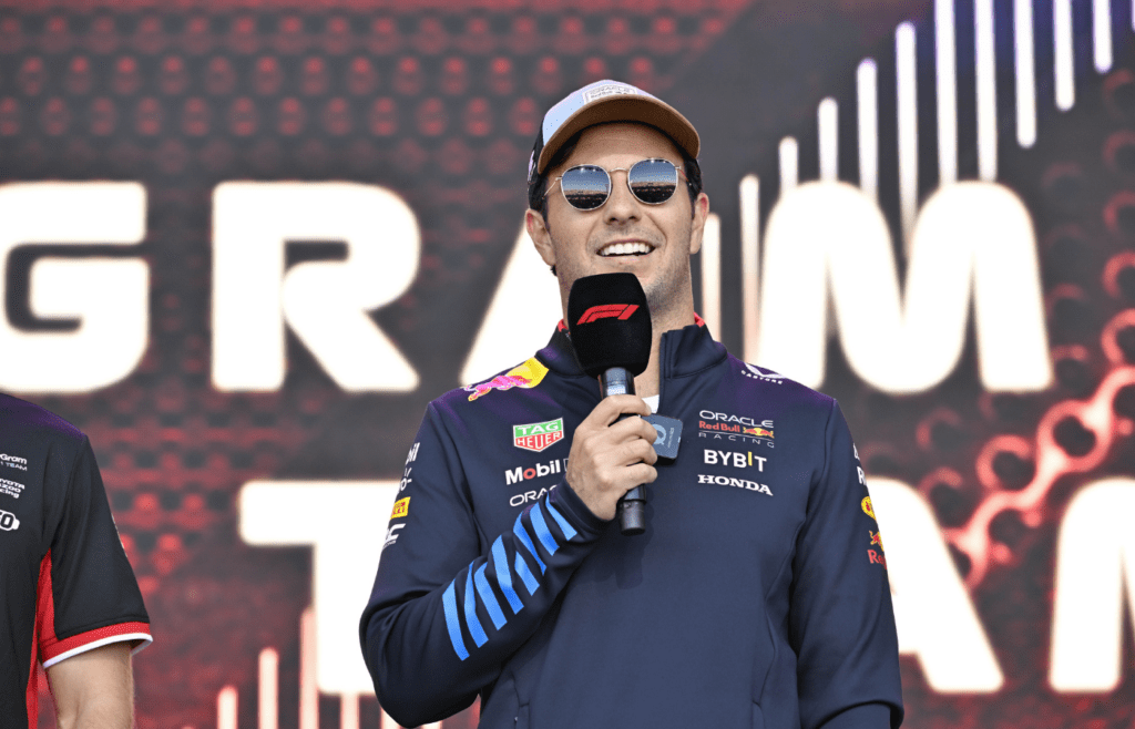 Oct 19, 2024; Austin, Texas, USA; Oracle Red Bull Racing driver Sergio Perez (11) of Team Mexico speaks to the crowd during a fan forum before the Sprint Race in the 2024 Formula One US Grand Prix at Circuit of the Americas. Mandatory Credit: Jerome Miron-Imagn Images