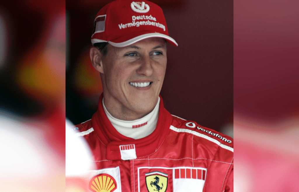 June 17, 2005; Indianapolis, IN, USA; Michael Schumacher of Scuderia Ferrari Marlboro smiles after the second practice session for the United States Grand Prix on Friday June 17, 2005 at the Indianpolis Motor Speedway. Mandatory Credit: Photo By Jeff Hanisch-Imagn Images Copyright (c) 2005 Jeff Hanisch