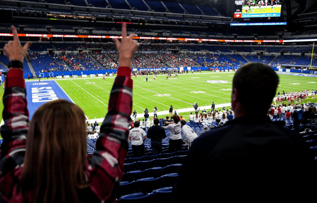 Heritage Hills fans cheer Saturday, Nov. 30, 2024, during the Class 3A state final matchup between Fort Wayne Bishop Luers and Heritage Hills at Lucas Oil Stadium in Indianapolis. Heritage Hills defeated the Fort Wayne Bishop Luers Knights, 38-15.
