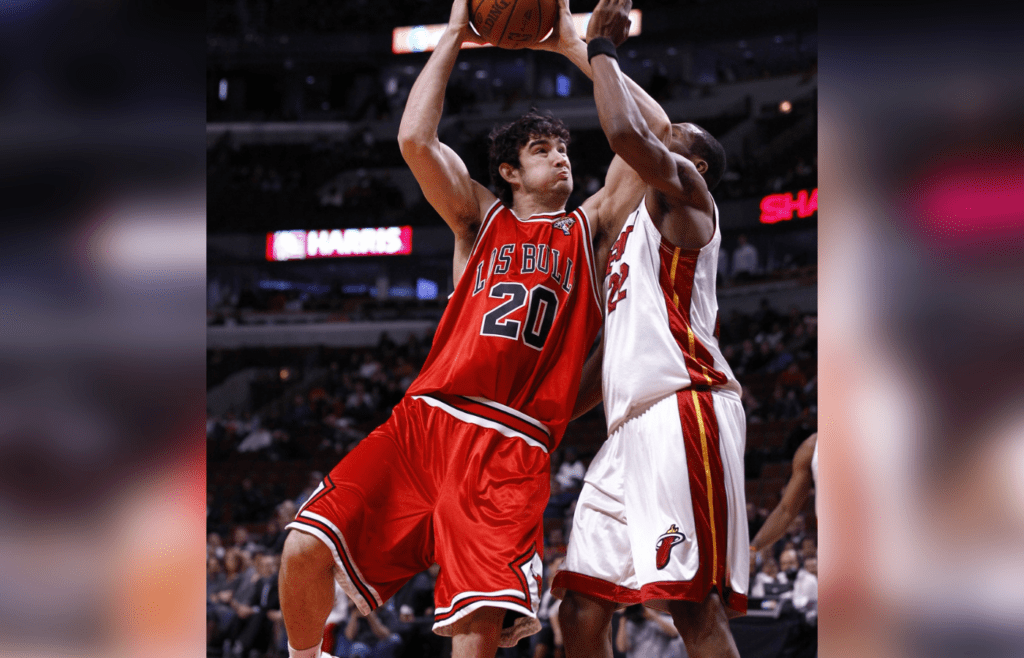 Mar 25, 2010; Chicago, IL, USA; Chicago Bulls forward Joe Alexander (20) shoots the ball over Miami Heat forward James Jones (22) during the second half at the United Center. The Miami Heat defeated the Chicago Bulls 103-74. Mandatory Credit: Mike DiNovo-Imagn Images