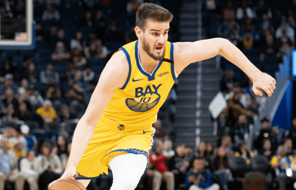 March 1, 2020; San Francisco, California, USA; Golden State Warriors forward Dragan Bender (10) dribbles the basketball during the fourth quarter against the Washington Wizards at Chase Center. Mandatory Credit: Kyle Terada-Imagn Images