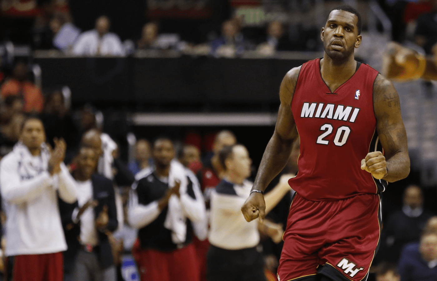 Jan 15, 2014; Washington, DC, USA; Miami Heat center Greg Oden (20) runs down the court after scoring against the Washington Wizards Girls in the second quarter at Verizon Center. The Wizards won 114-97. Mandatory Credit: Geoff Burke-Imagn Images