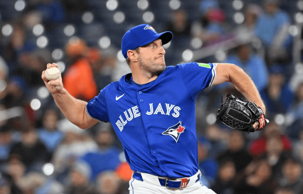 Mar 29, 2025; Toronto, Ontario, CAN; Toronto Blue Jays starting pitcher Max Scherzer (31) delivers a pitch against the Baltimore Orioles in the first inning at Rogers Centre. Mandatory Credit: Dan Hamilton-Imagn Images