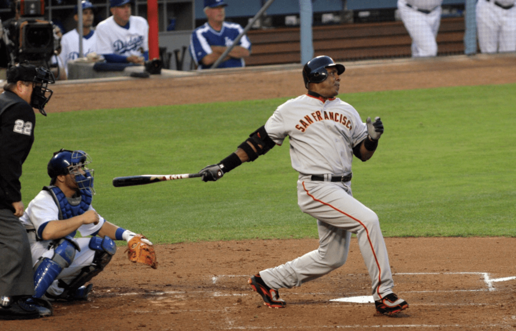 August 2, 2007; Los Angeles, CA, USA; San Francisco Giants leftfielder Barry Bonds (25) hits a single in the second inning against the Los Angeles Dodgers at Dodger Stadium. Mandatory Credit: Gary A. Vasquez-Imagn Images