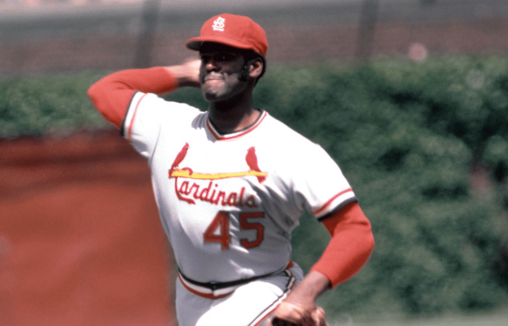 May 1974; Chicago, IL, USA; FILE PHOTO; St. Louis Cardinals pitcher Bob Gibson (45) delivers a pitch during the 1968 season against the Chicago Cubs at Wrigley Field. Mandatory Credit: Malcolm Emmons-Imagn Images