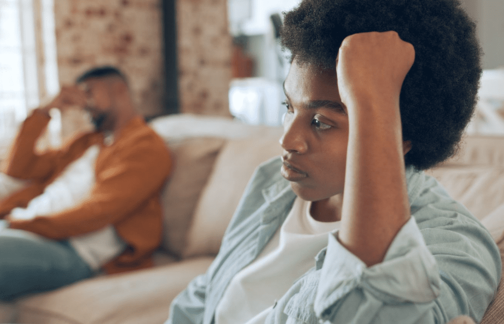 A person looking hurt while someone else dismisses them