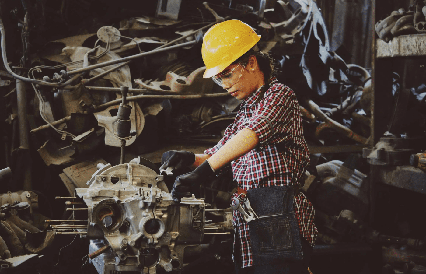 A technician working on elevator machinery