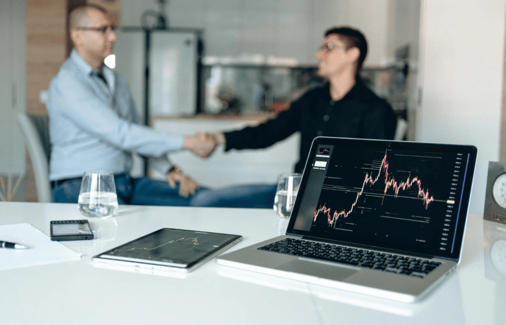 A laptop showing a beginner investment app