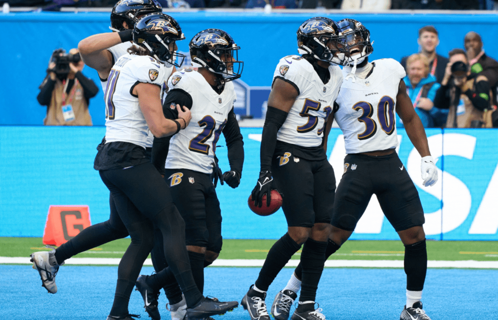 Oct 15, 2023; London, United Kingdom; Baltimore Ravens celebrate winning the ball from a punt return during the first half of an NFL International Series game at Tottenham Hotspur Stadium. Mandatory Credit: Peter van den Berg-Imagn Images