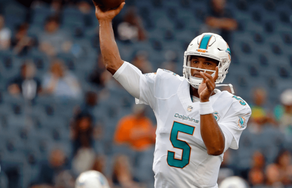 Miami Dolphins quarterback Josh Freeman #5 warms up before the game against the Chicago Bears in a preseason NFL football game at Soldier Field.