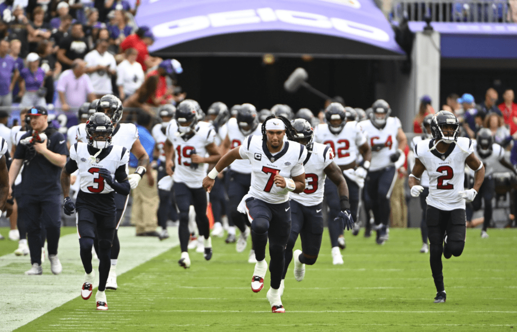 Sep 10, 2023; Baltimore, Maryland, USA; Houston Texans quarterback C.J. Stroud (7) leads the team on the field before the game against the Baltimore Ravens at M&T Bank Stadium. Mandatory Credit: Brad Mills-Imagn Images