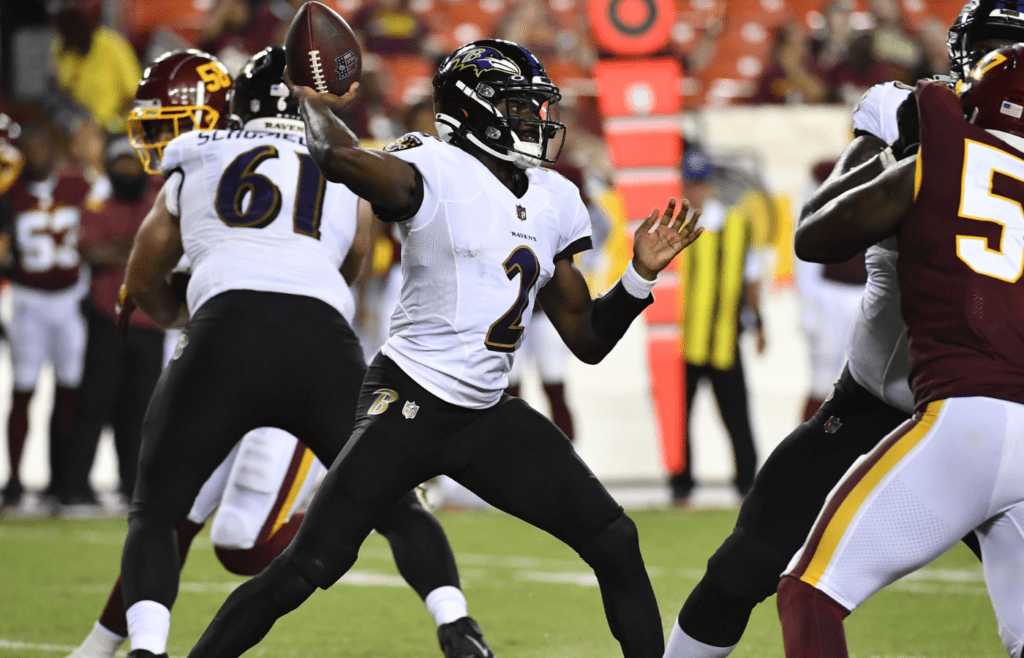 Aug 28, 2021; Landover, Maryland, USA; Baltimore Ravens quarterback Tyler Huntley (2) attempts a pass against the Washington Football Team during the second half at FedExField. Mandatory Credit: Brad Mills-Imagn Images
