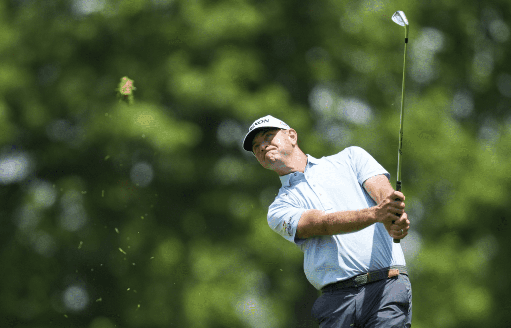 May 29, 2025; Dublin, Ohio, USA; Lucas Glover plays his shot from the fairway on the ninth hole during the first round of the Memorial Tournament presented by Workday golf tournament. Mandatory Credit: Aaron Doster-Imagn Images