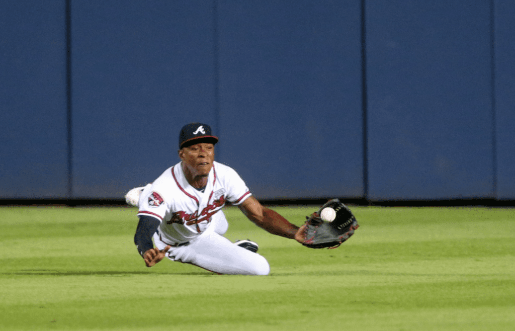 Sep 15, 2014; Atlanta, GA, USA; Atlanta Braves center fielder B.J. Upton (2) catches a ball for an out against Washington Nationals second baseman Asdrubal Cabrera (not pictured) in the third inning at Turner Field. Mandatory Credit: Jason Getz-Imagn Images