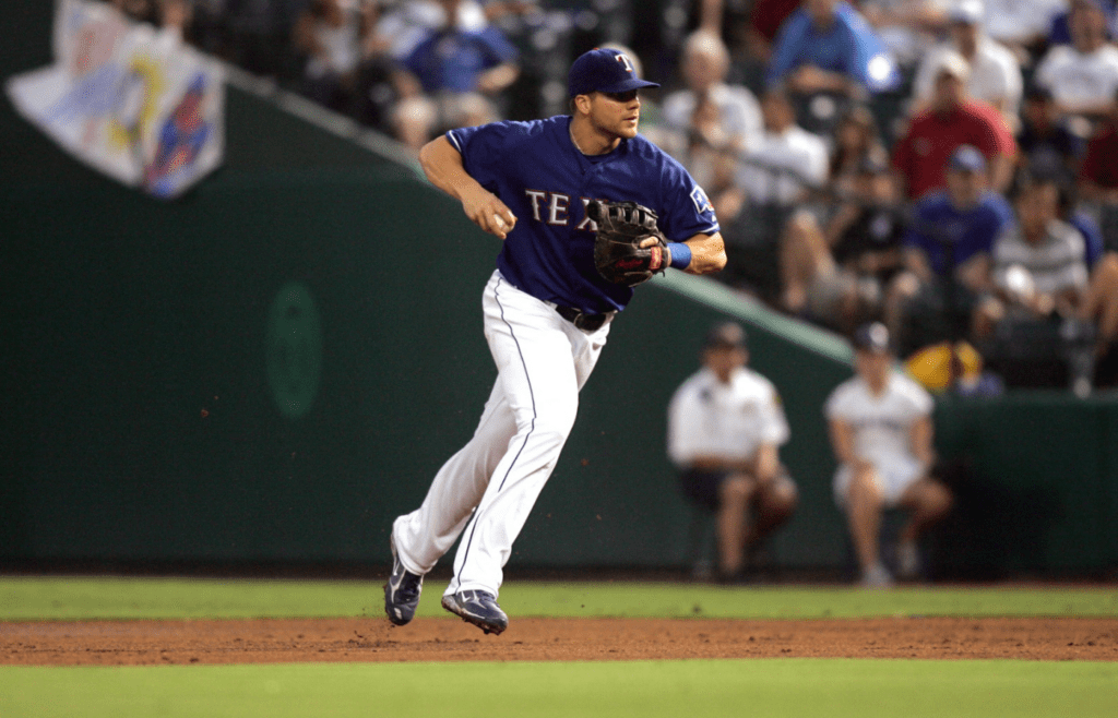 Aug 17, 2008; Arlington, TX, USA; Texas Rangers first baseman Chris Davis (19) throws to first base against the Tampa Bay Devil Rays at The Rangers Ballpark. Mandatory Credit: Tim Heitman-Imagn Images
