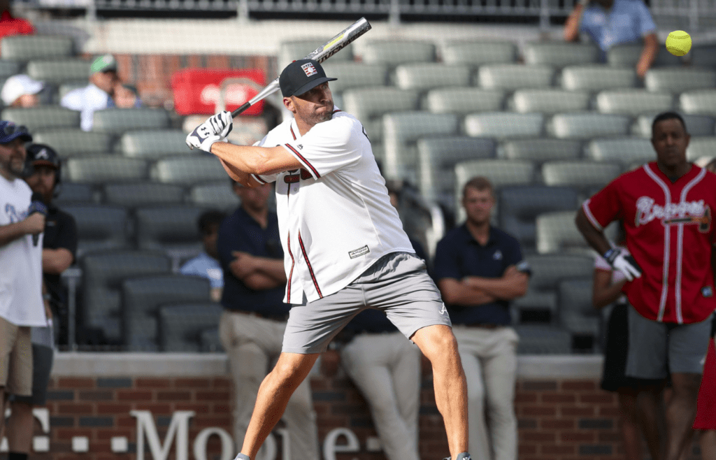 Aug 11, 2018; Atlanta, GA, USA; Former Atlanta Braves outfielder Jeff Francoeur (7) hits at the Alumni Softball Home Run Derby before a game against the Milwaukee Brewers at SunTrust Park. Mandatory Credit: Brett Davis-Imagn Images