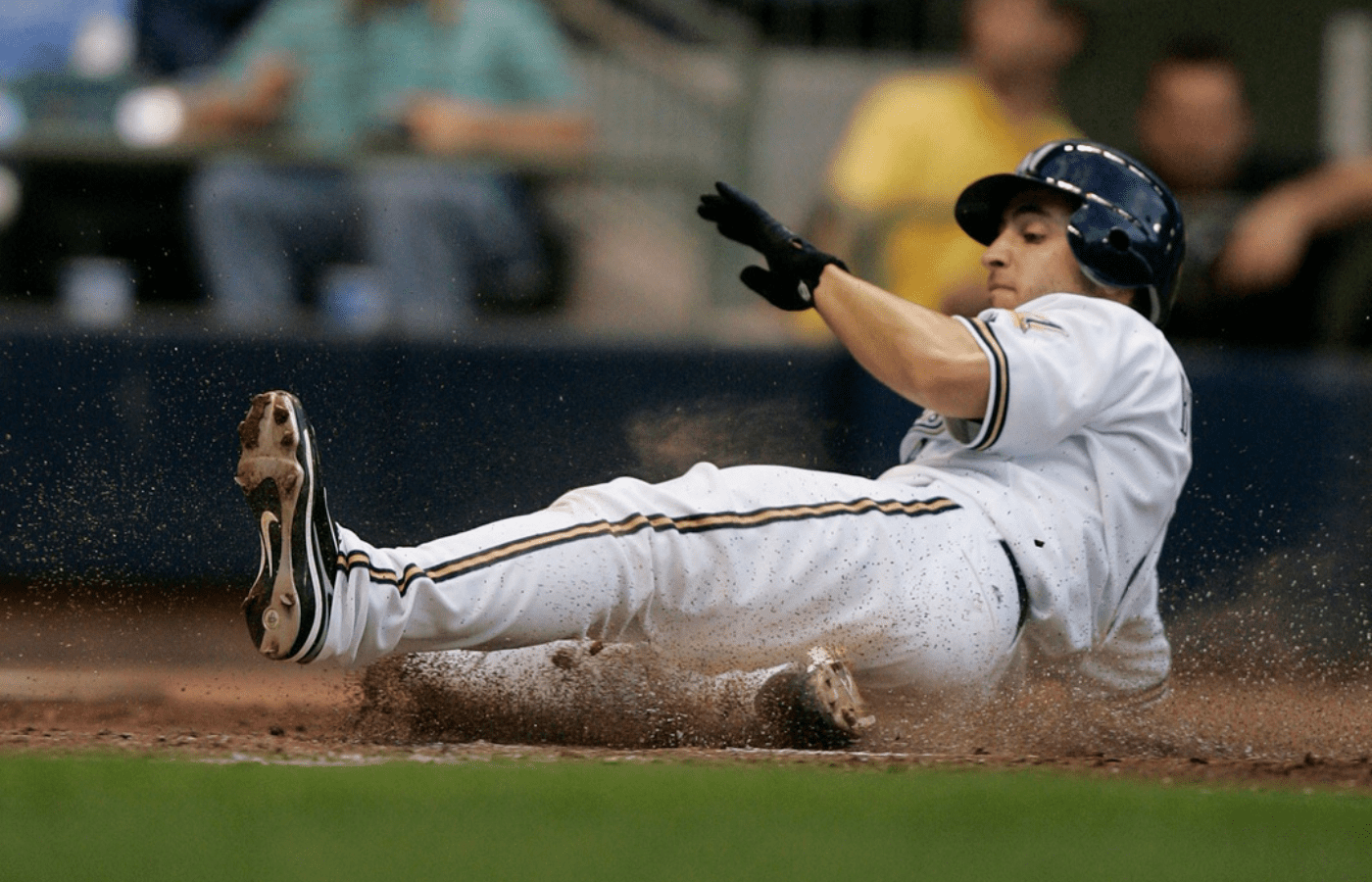 Milwaukee Brewers # 8 Ryan Braun slides into home plate on a triple by Prince Fielder in the third inning against the San Diego Padres in the of the MLB baseball game at Miller Park, Saturday, September 6, 2008.