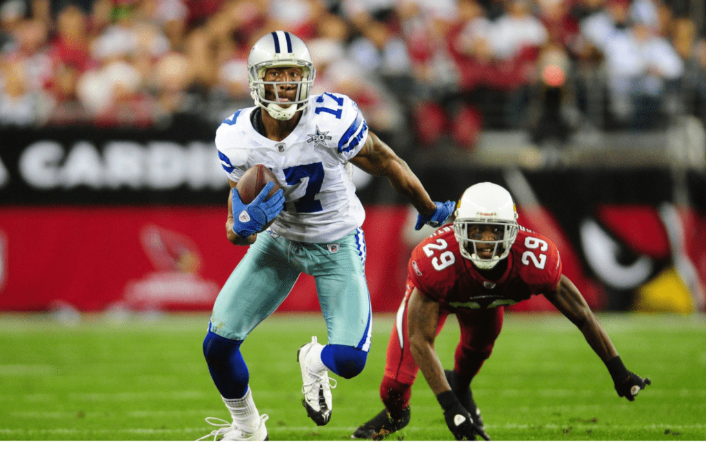 Dec. 25, 2010; Glendale, AZ, USA; Dallas Cowboys wide receiver (17) Sam Hurd evades Arizona Cardinals cornerback (29) Dominique Rodgers-Cromartie at University of Phoenix Stadium. Mandatory Credit: Mark J. Rebilas-Imagn Images