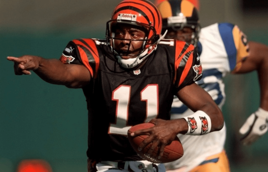 Bengals' quarterback Akili Smith yells for receivers while being pressured by the Rams' Jay Williams during the fourth quarter of their game played Sunday at Cinergy Field