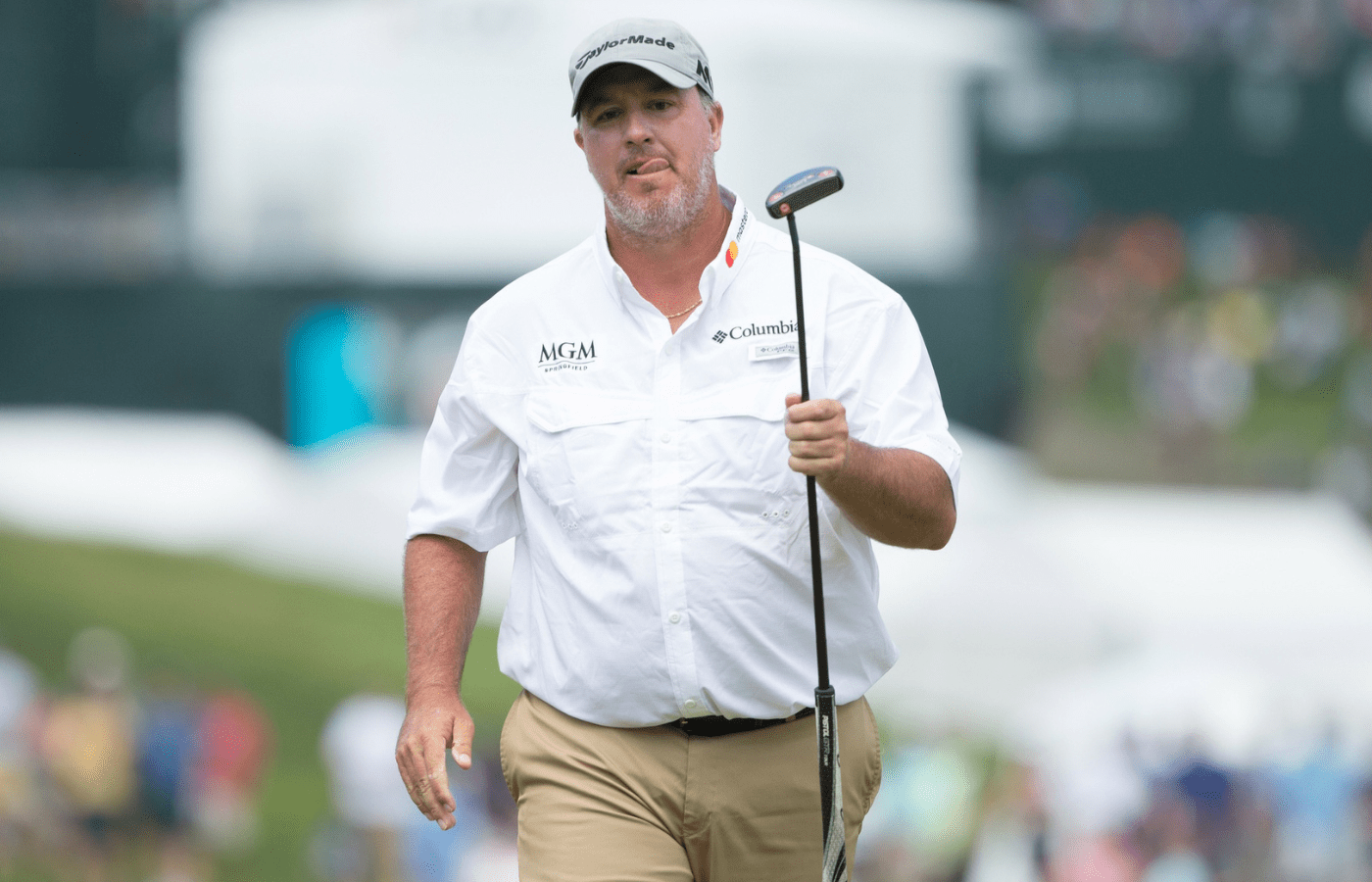 Boo Weekley reacts to his putt attempt on the 1st hole during the final round of the Travelers Championship golf tournament at TPC River Highlands