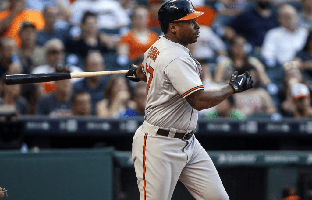Baltimore Orioles right fielder Delmon Young (27) hits a single during the fourth inning against the Houston Astros at Minute Maid Park