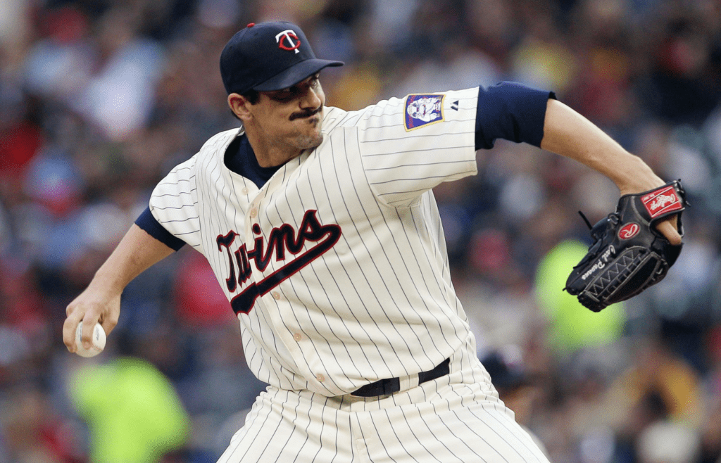 Minnesota Twins starting pitcher Carl Pavano (48) delivers a pitch in the first inning against the Detroit Tigers at Target Field