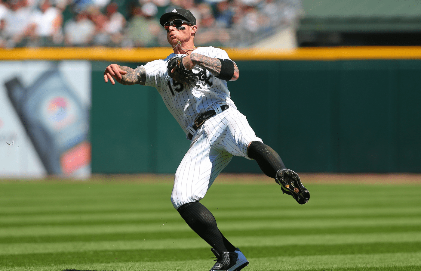 Chicago White Sox second baseman Brett Lawrie (15) makes a throw in a game against the Atlanta Braves at U.S. Cellular Field