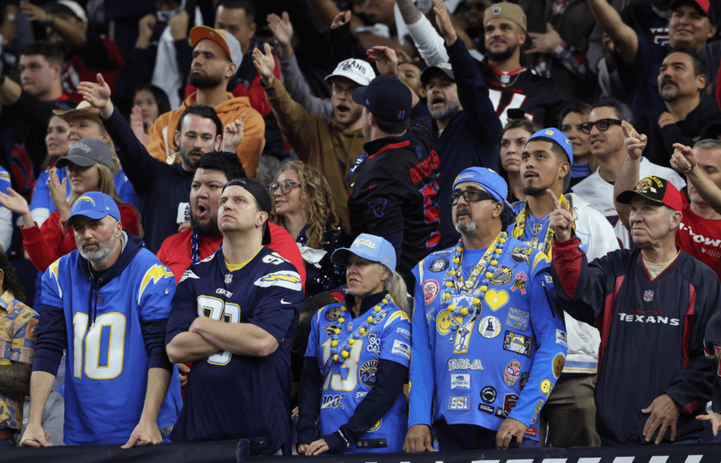 Los Angeles Chargers fans react during the fourth quarter against the Houston Texans in an AFC wild card game at NRG Stadium