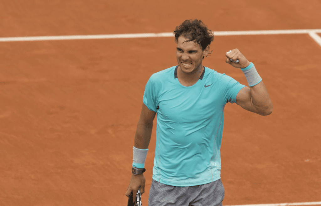 Rafael Nadal (ESP) celebrates recording match point during his match against Dominic Thiem (AUT) on day five at the 2014 French Open at Roland Garros
