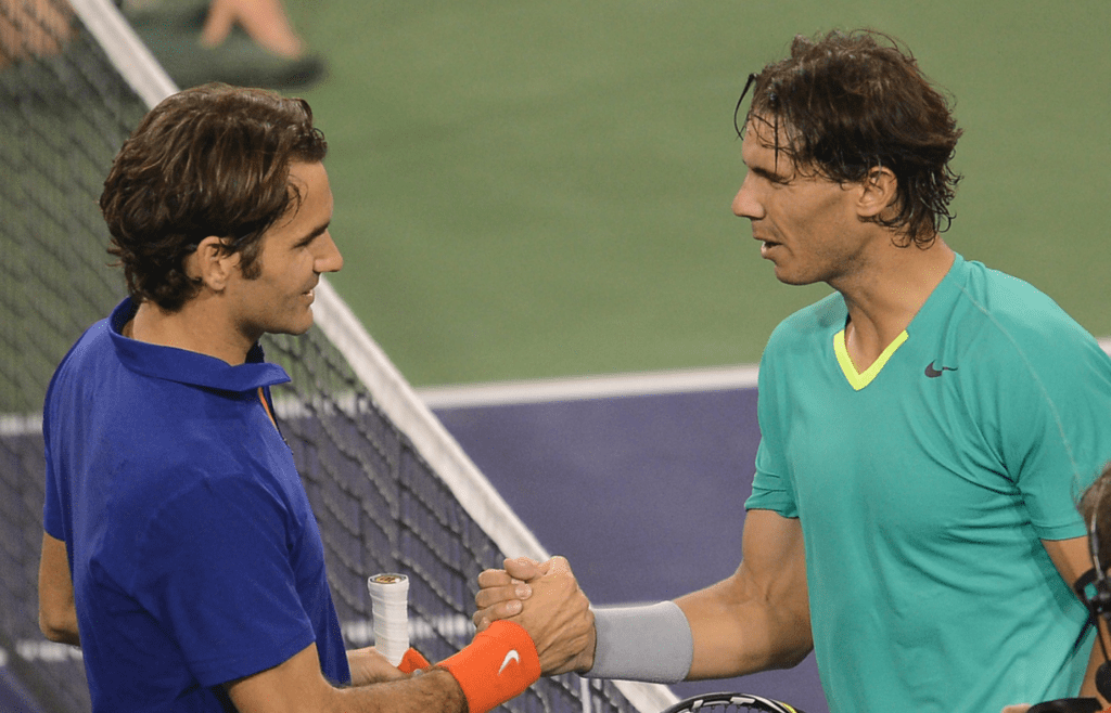 Rafael Nadal (ESP) and Roger Federer (SUI) shake hands after their quarter final match at the BNP Paribas Open at the Indian Wells Tennis Garden. Nadal won 6-4, 6-2