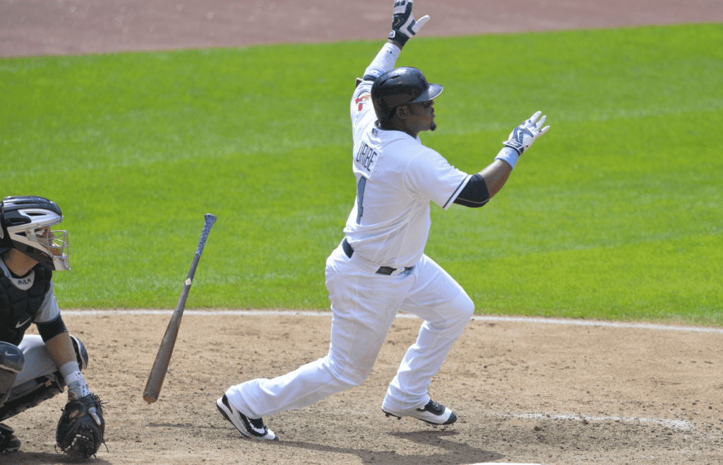 Cleveland Indians third baseman Juan Uribe (4) doubles in the ninth inning against the Chicago White