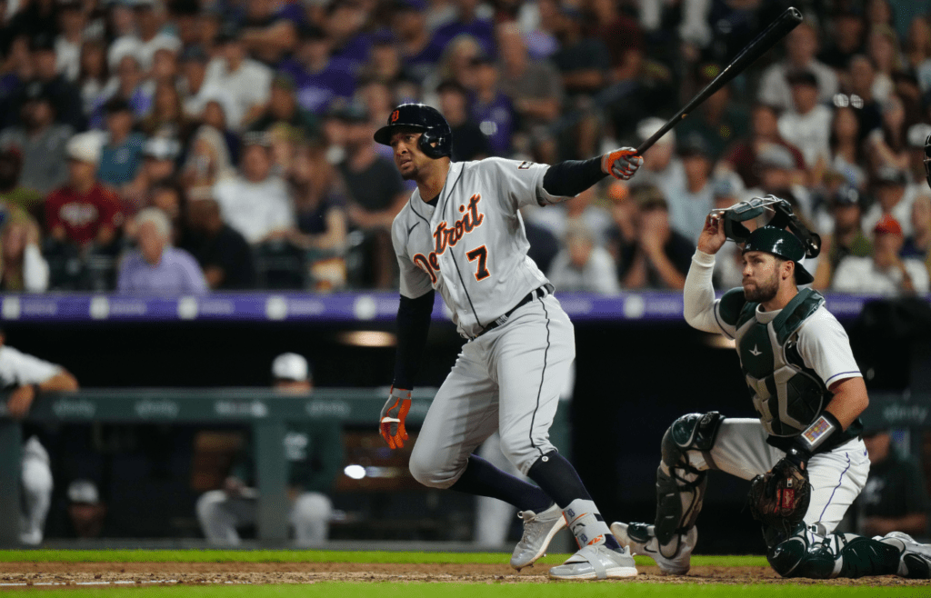 Detroit Tigers second baseman Jonathan Schoop (7) hits an RBI double in the seventh inning against the Colorado Rockies at Coors Field
