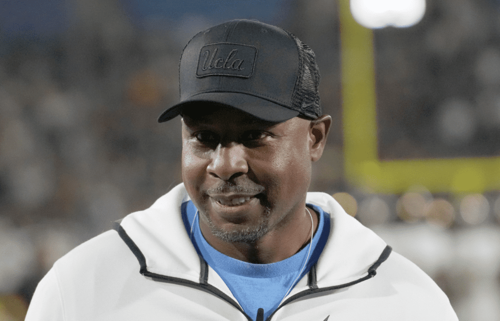 Oct 28, 2023; Pasadena, California, USA; UCLA Bruins former receiver J.J. Stokes watches from the sidelines against the Colorado Buffaloes in the second half at Rose Bowl. UCLA defeated Colorado 28-16. Mandatory Credit: Kirby Lee-Imagn Images