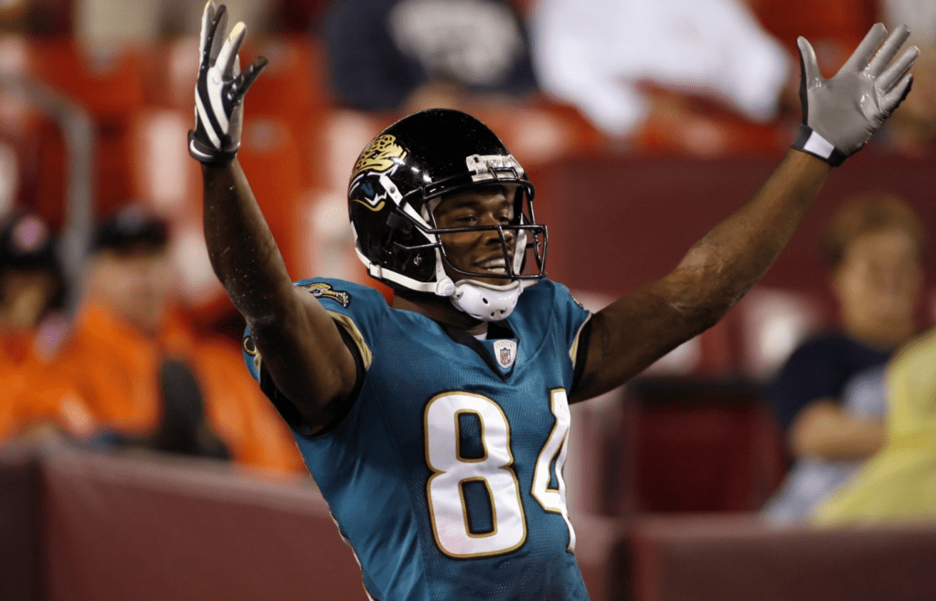 August 28, 2008; Landover, MD, USA; Jacksonville Jaguars wide receiver Troy Williamson (84) celebrates a fourth quarter touchdown during the Jaguars 24-3 win over the Washington Redskins at FedEx Field. Mandatory Credit: Geoff Burke-Imagn Images