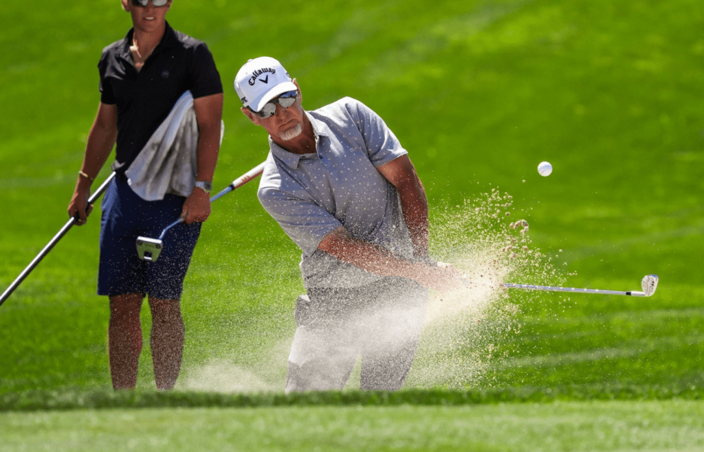 David Duval hits out of a bunker onto the ninth green during the pro-am of the Galleri Classic at Mission Hills Country Club in Rancho Mirage, Calif., Wednesday, March 26, 2025.