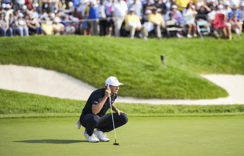Jun 1, 2025; Dublin, Ohio, USA; Jordan Spieth lines up a putt on the 18th green during the final round of the Memorial Tournament presented by Workday golf tournament. Mandatory Credit: Aaron Doster-Imagn Images