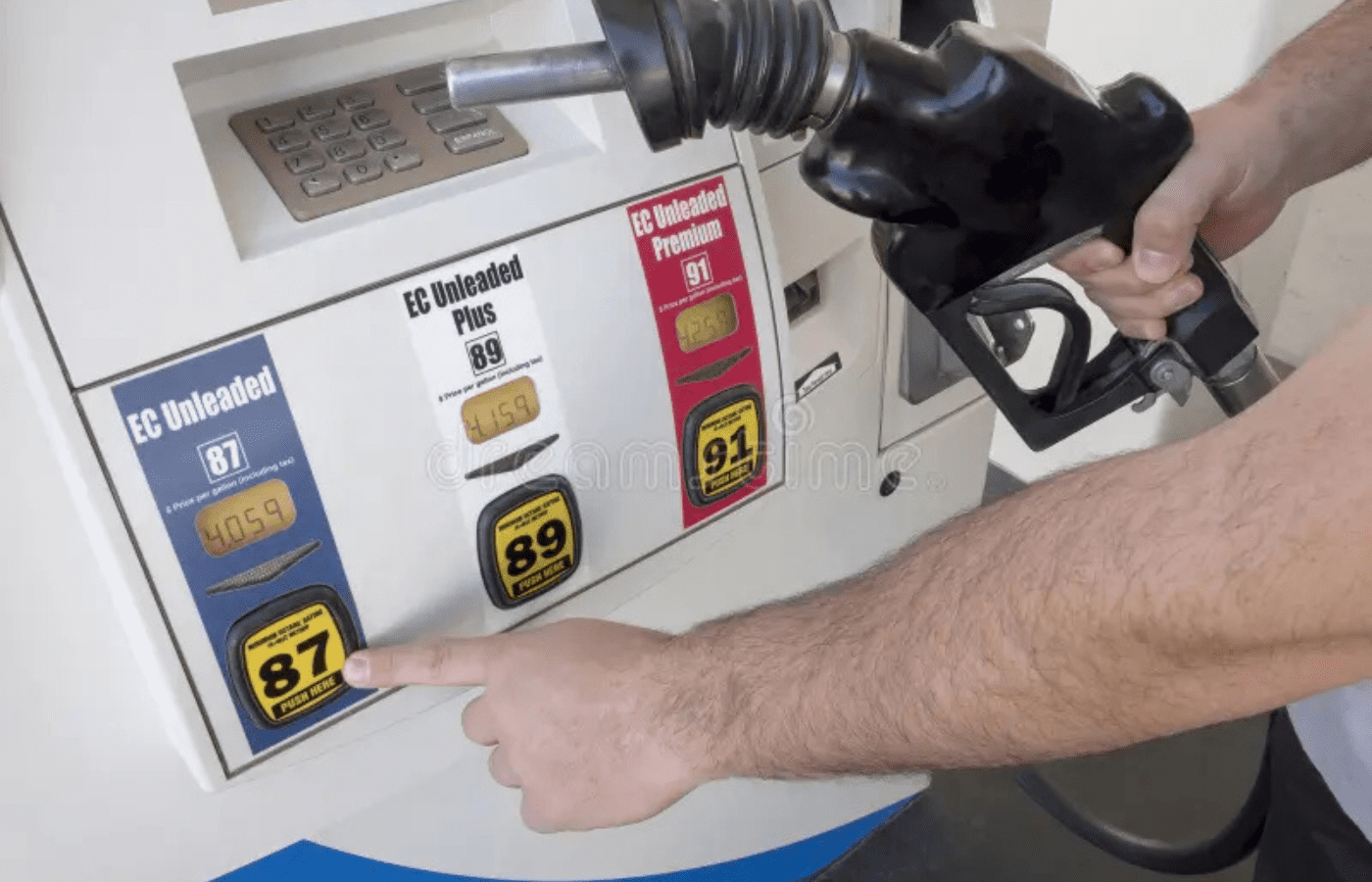 A person choosing the premium option at a gas pump