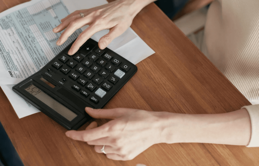 A frustrated person reviewing a bank statement