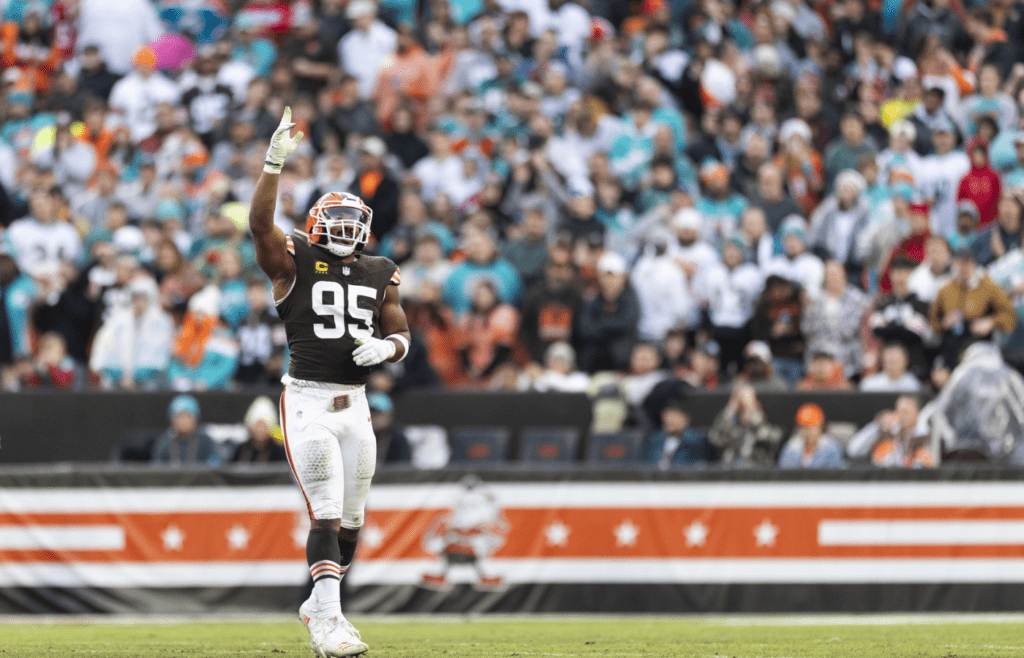 Dec 29, 2024; Cleveland, Ohio, USA; Cleveland Browns defensive end Myles Garrett (95) celebrates his sack against the Miami Dolphins during the first quarter at Huntington Bank Field. Mandatory Credit: Scott Galvin-Imagn Images