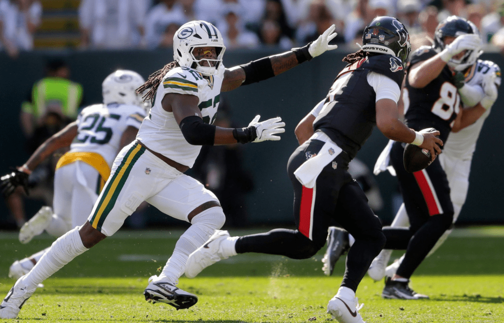 Green Bay Packers defensive end Rashan Gary (52) chases Houston Texans quarterback C.J. Stroud (7) on Sunday, October 20, 2024 at Lambeau Field in Green Bay, Wis. Wm. Glasheen USA TODAY NETWORK-Wisconsin