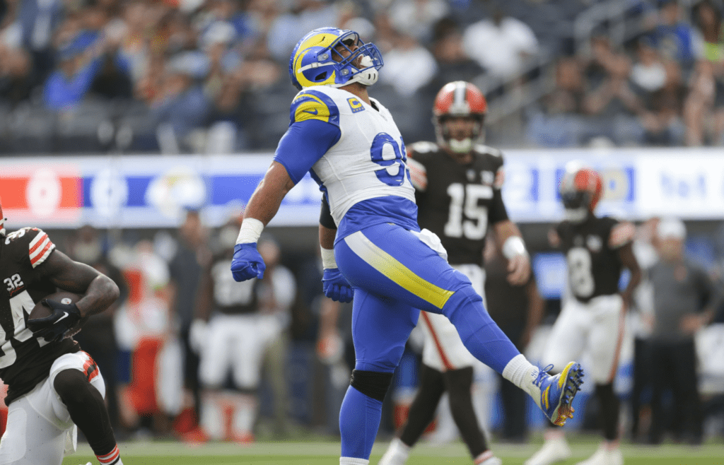 Dec 3, 2023; Inglewood, California, USA; Los Angeles Rams defesnive tackle Aaron Donald (99) celebrates in the first half in a game against the Cleveland Browns at SoFi Stadium. Mandatory Credit: Yannick Peterhans-Imagn Images