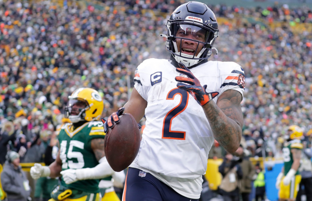 Chicago Bears wide receiver DJ Moore (2) scores a touchdown on a reception against the Green Bay Packers in the fourth quarter during their football game Sunday, January 5, 2025, at Lambeau Field in Green Bay, Wisconsin.