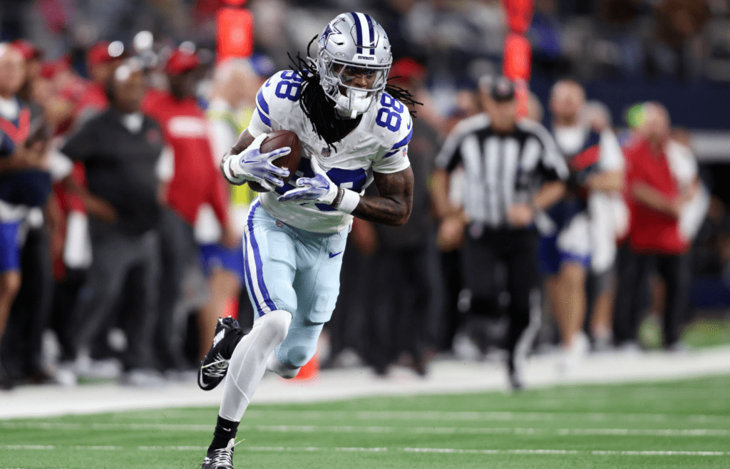 Dec 22, 2024; Arlington, Texas, USA; Dallas Cowboys wide receiver CeeDee Lamb (88) runs after catching a pass against the Tampa Bay Buccaneers in the second quarter at AT&T Stadium. Mandatory Credit: Tim Heitman-Imagn Images