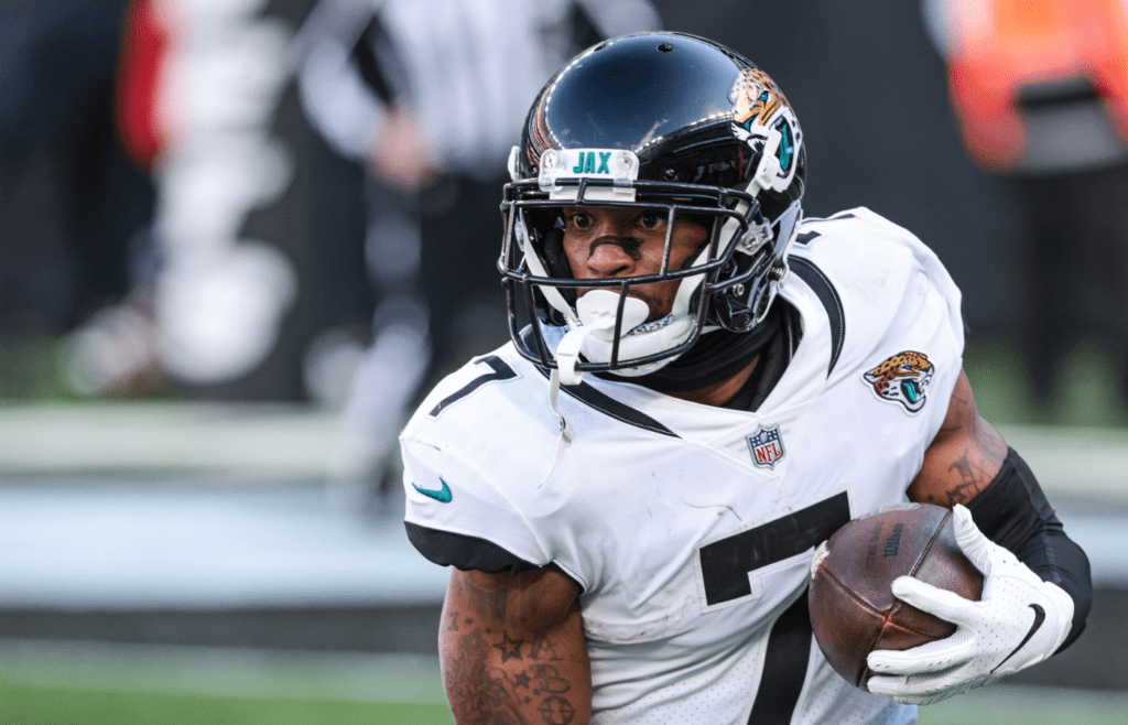Dec 26, 2021; East Rutherford, New Jersey, USA; Jacksonville Jaguars wide receiver Tavon Austin (7) gains yards after a catch against the New York Jets during the first half at MetLife Stadium. Mandatory Credit: Vincent Carchietta-Imagn Images