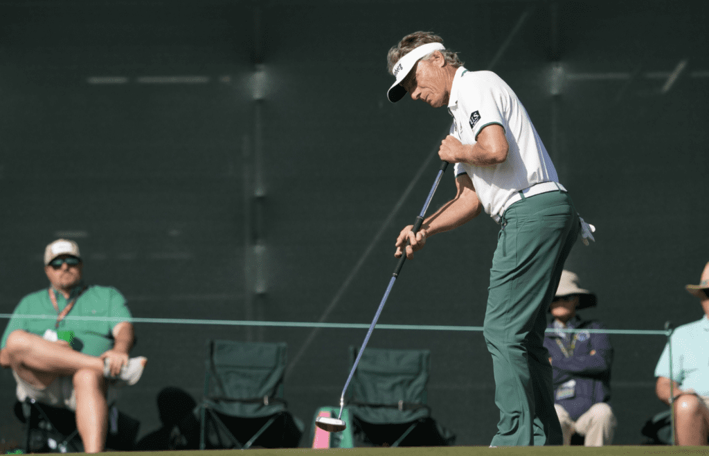 Apr 11, 2025; Augusta, Georgia, USA; Bernhard Langer putts on the 17th green during the second round of the Masters Tournament at Augusta National Golf Club. Mandatory Credit: Michael Madrid-Imagn Images