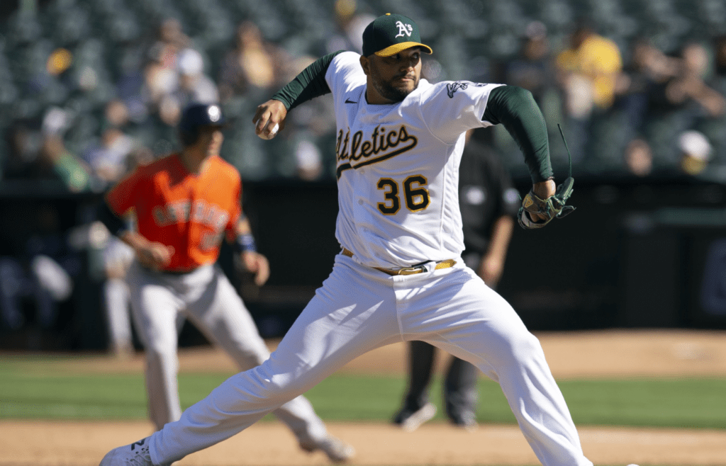 Sep 26, 2021; Oakland, California, USA; Oakland Athletics pitcher Yusmeiro Petit (36) delivers a pitch against the Houston Astros in the sixth inning at RingCentral Coliseum. Mandatory Credit: D. Ross Cameron-Imagn Images